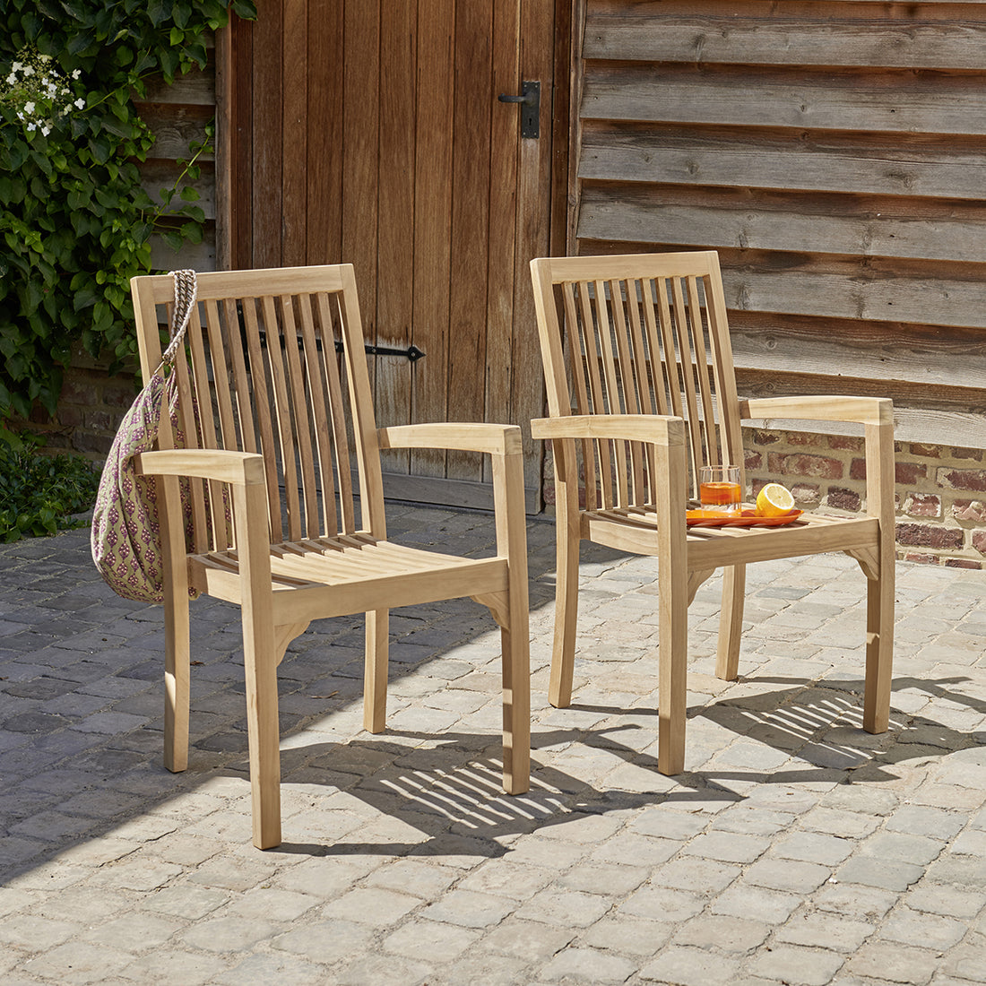 MALTE - Poltrone da giardino in teak massello impilabili (set di 2)