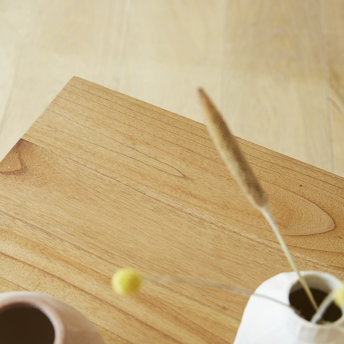 TILO - Couchtisch aus massivem Mindi-Holz 110 cm