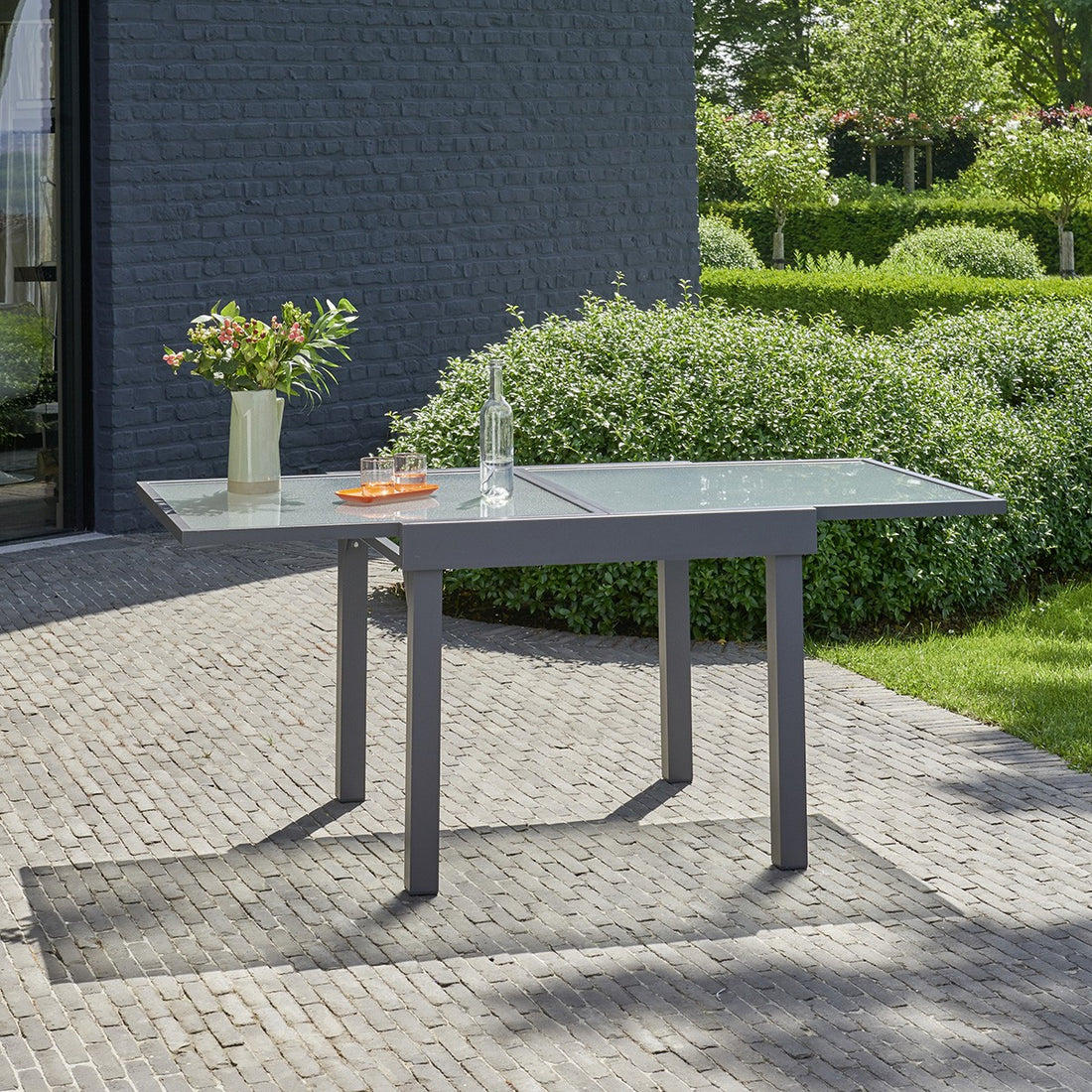 MODULO - Tavolo da giardino allungabile in alluminio grigio 4/8 pers.
