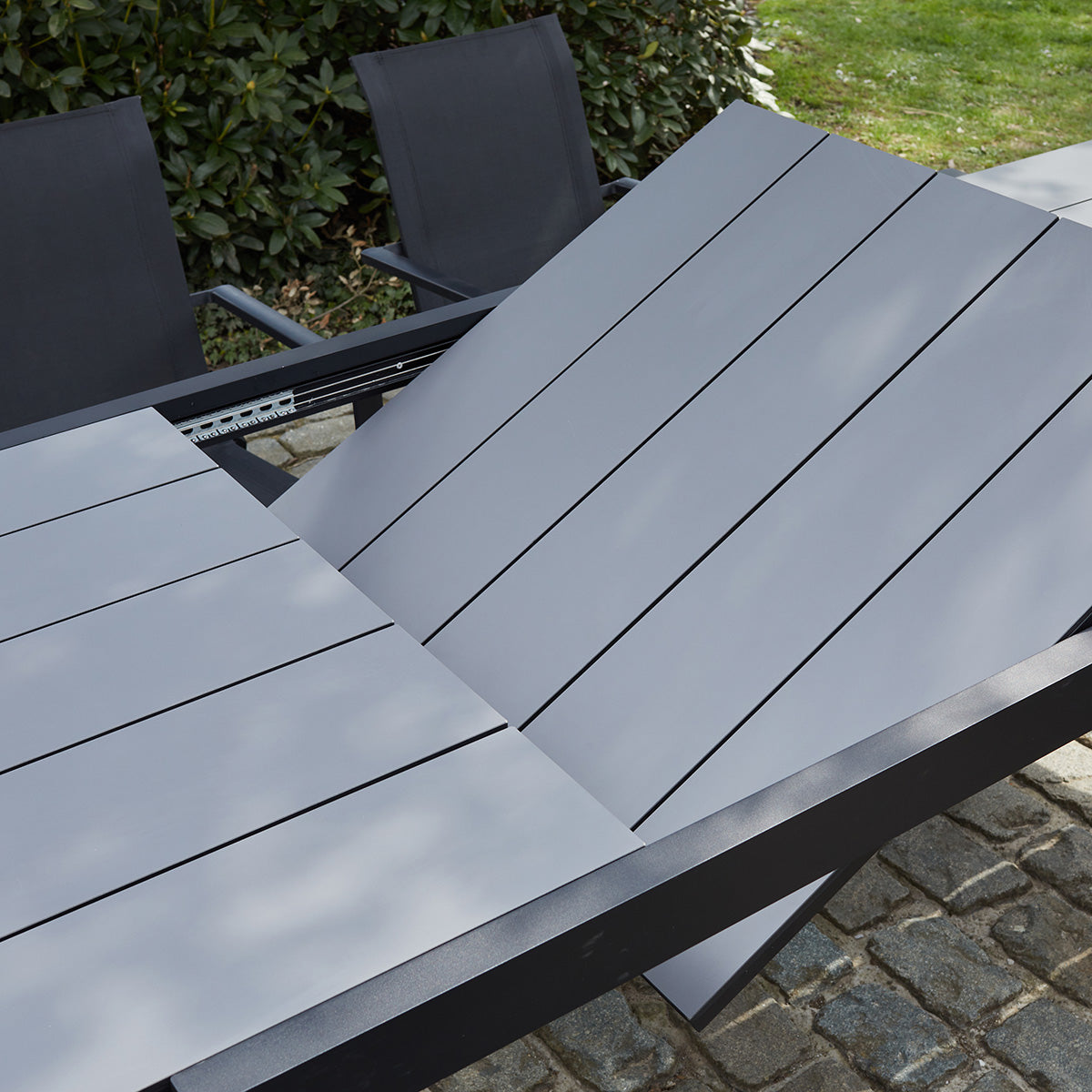 HPL STAR - Set di mobili da giardino in alluminio nero e textilene grigio 6/10 pers.