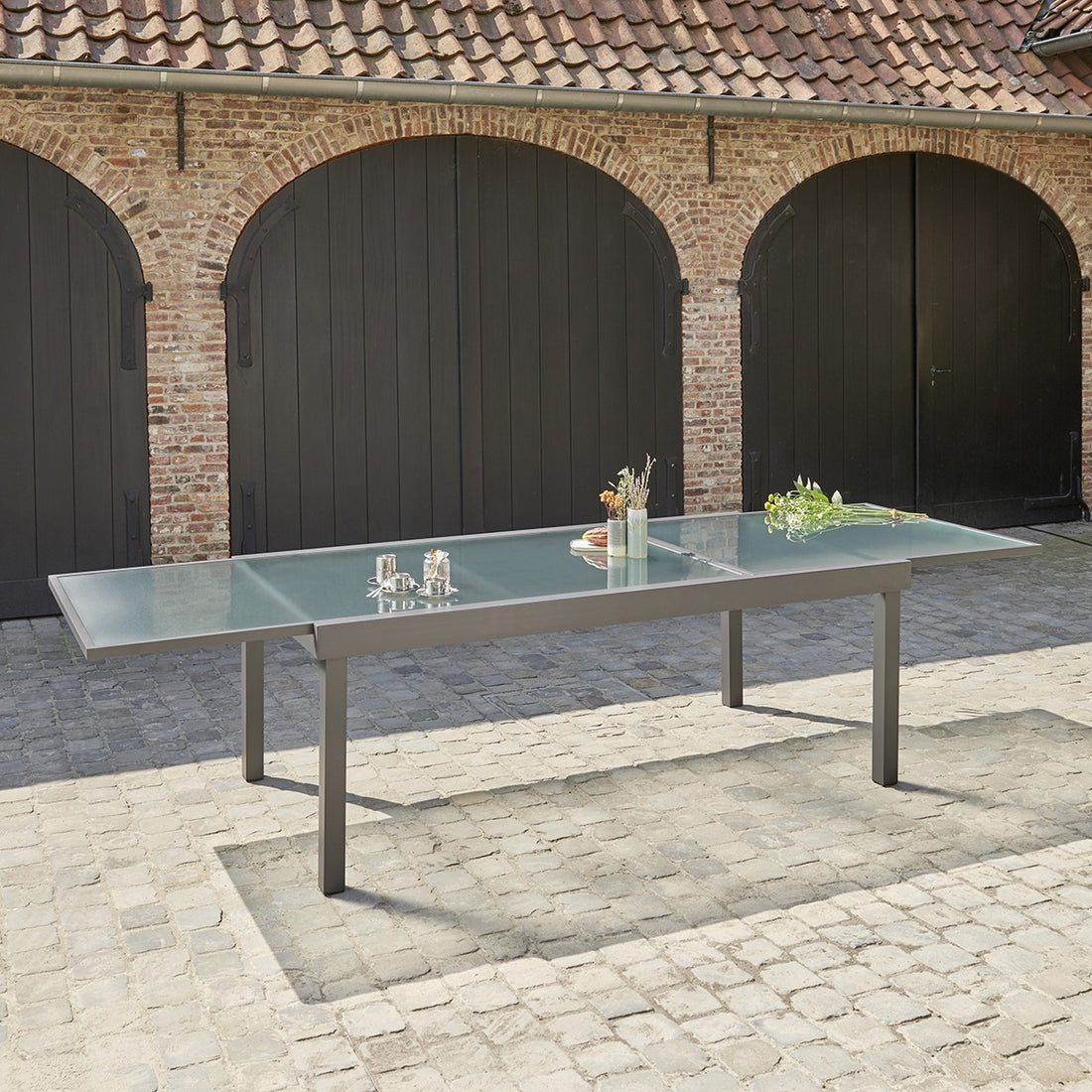 MODULO - Tavolo da giardino allungabile in alluminio grigio 8/12 pers.