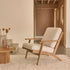 Poltrona in teak massello con tessuto bouclé